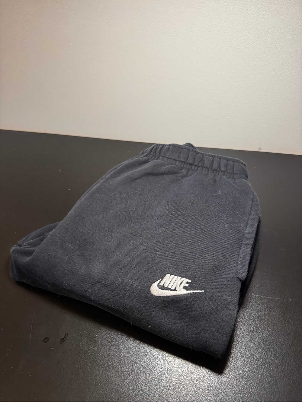 Nike Kids Black Sweatpants with White Swoosh Logo